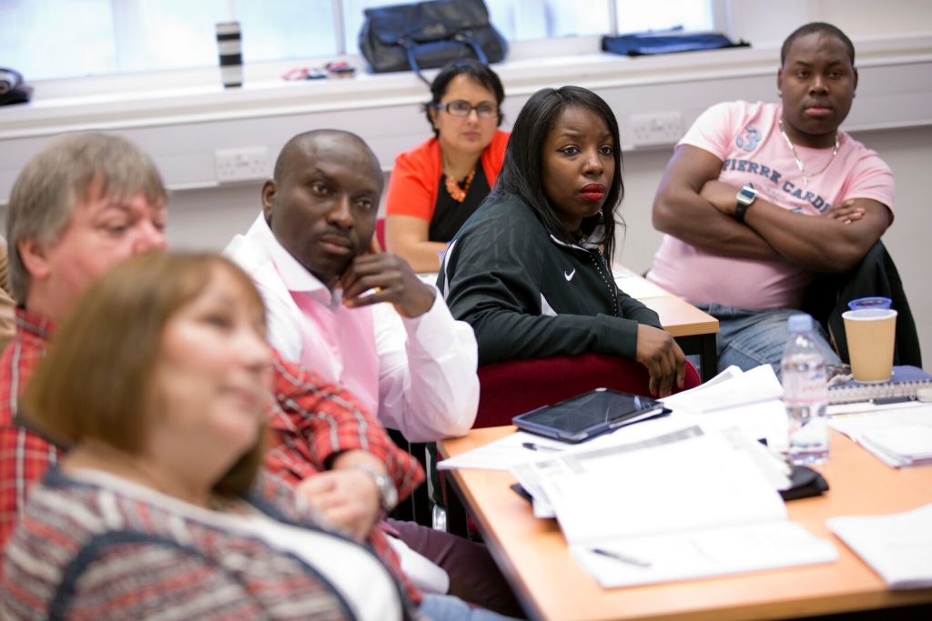 Course participants around a table